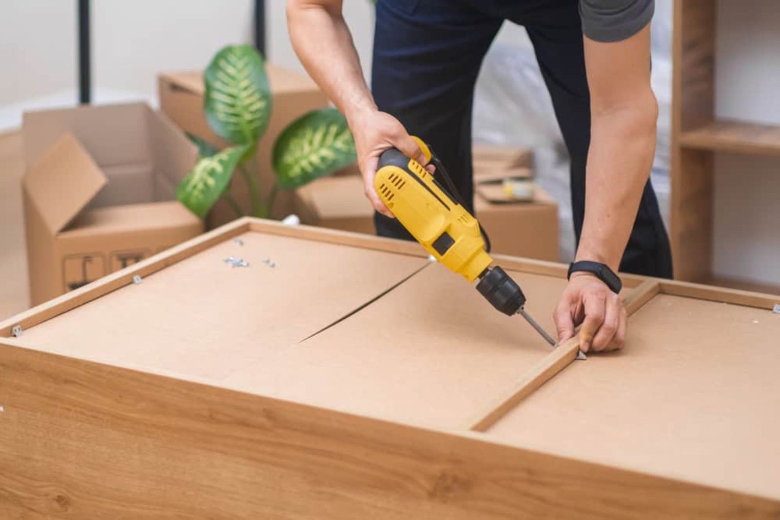 Assembling furniture with a drill