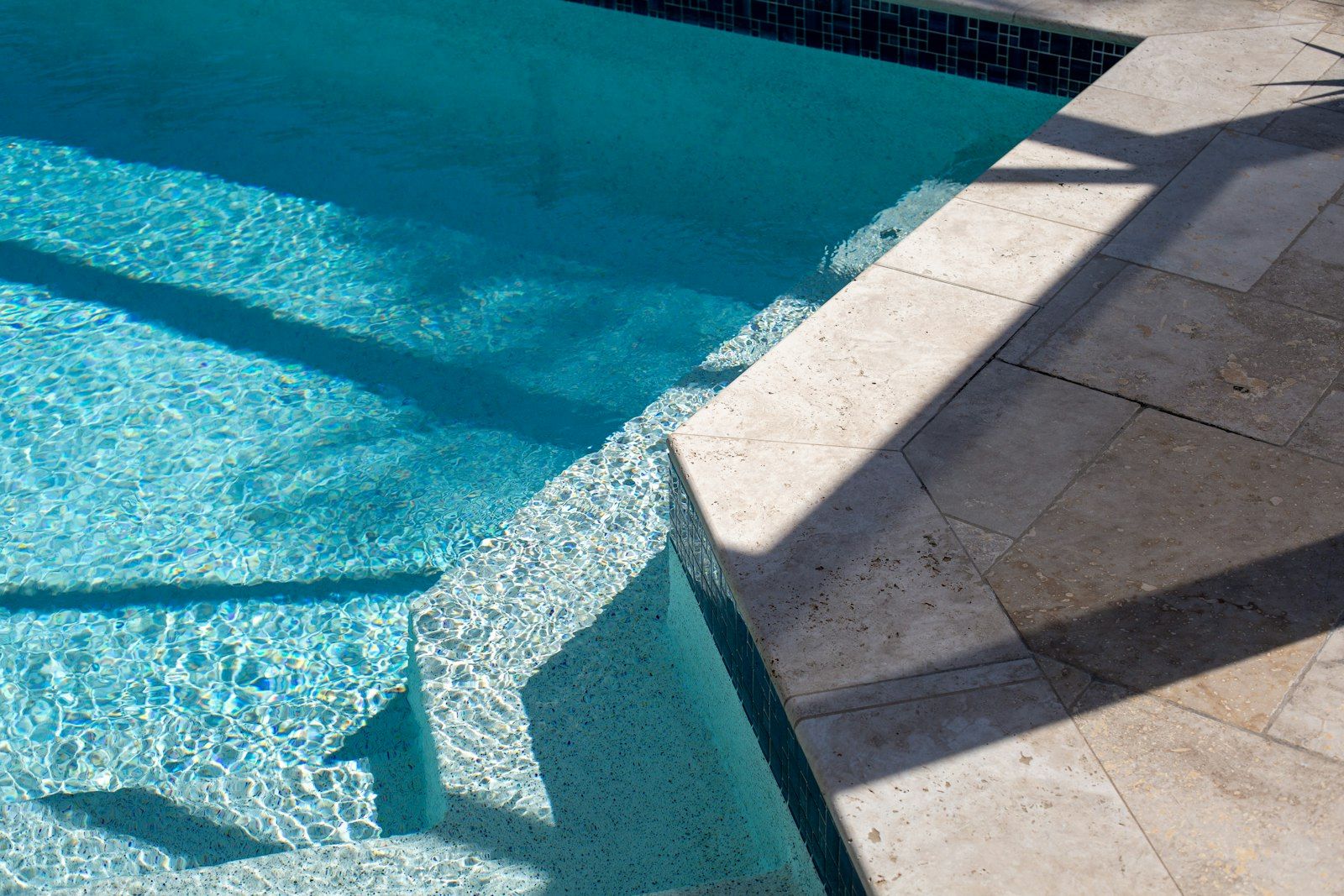 Clear pool water over tiled steps